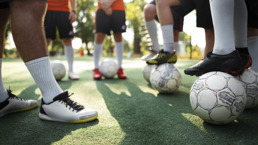 football trainer teaching his pupils scaled e1784146894715